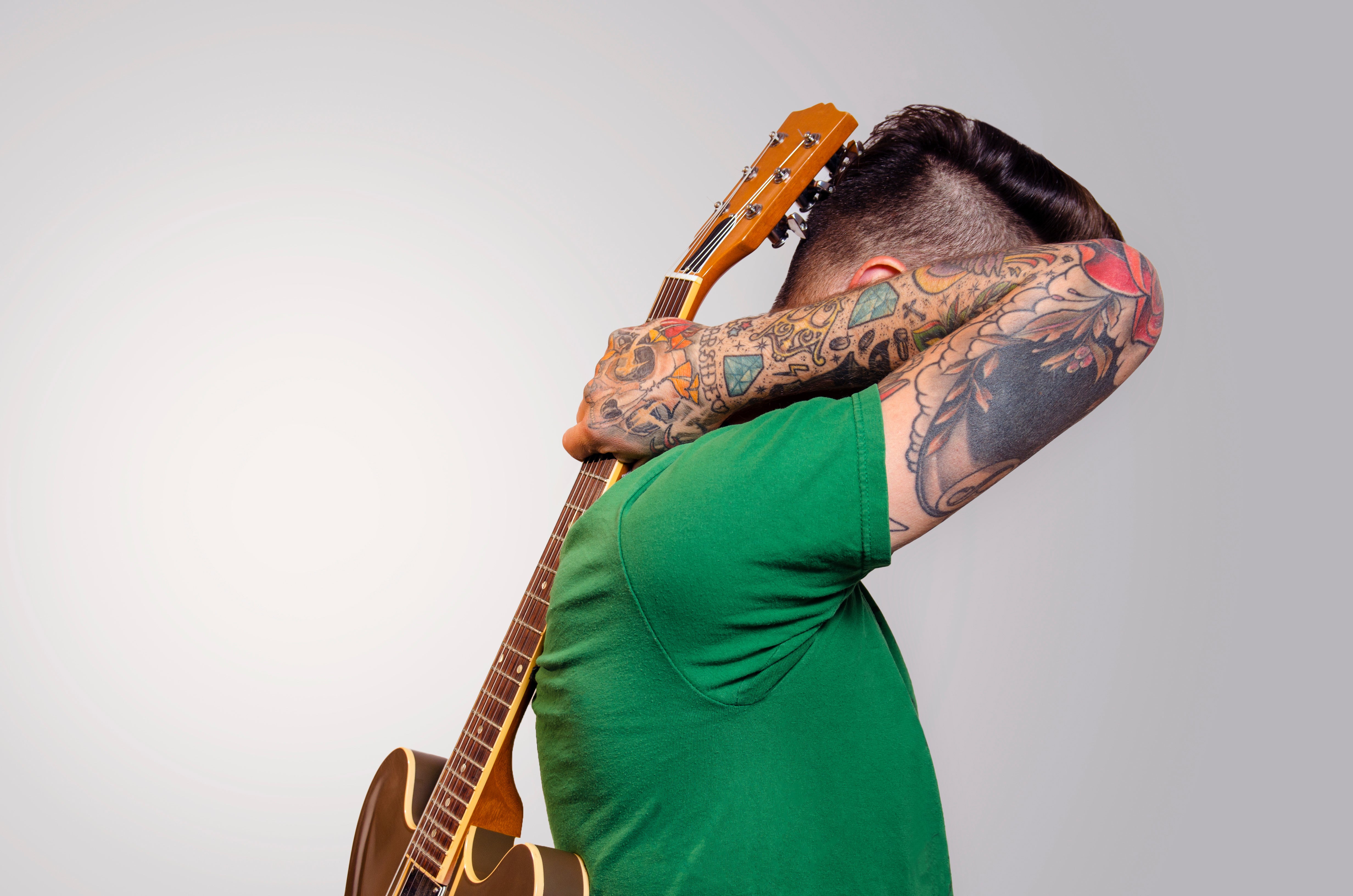 71 Music Guitar Tattoos For Arm