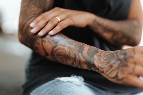 Applying sunscreen on tattooed skin
