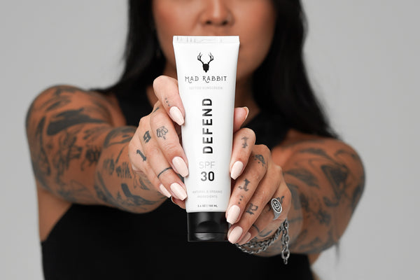 Tattooed skin protected with Mad Rabbit SPF 30